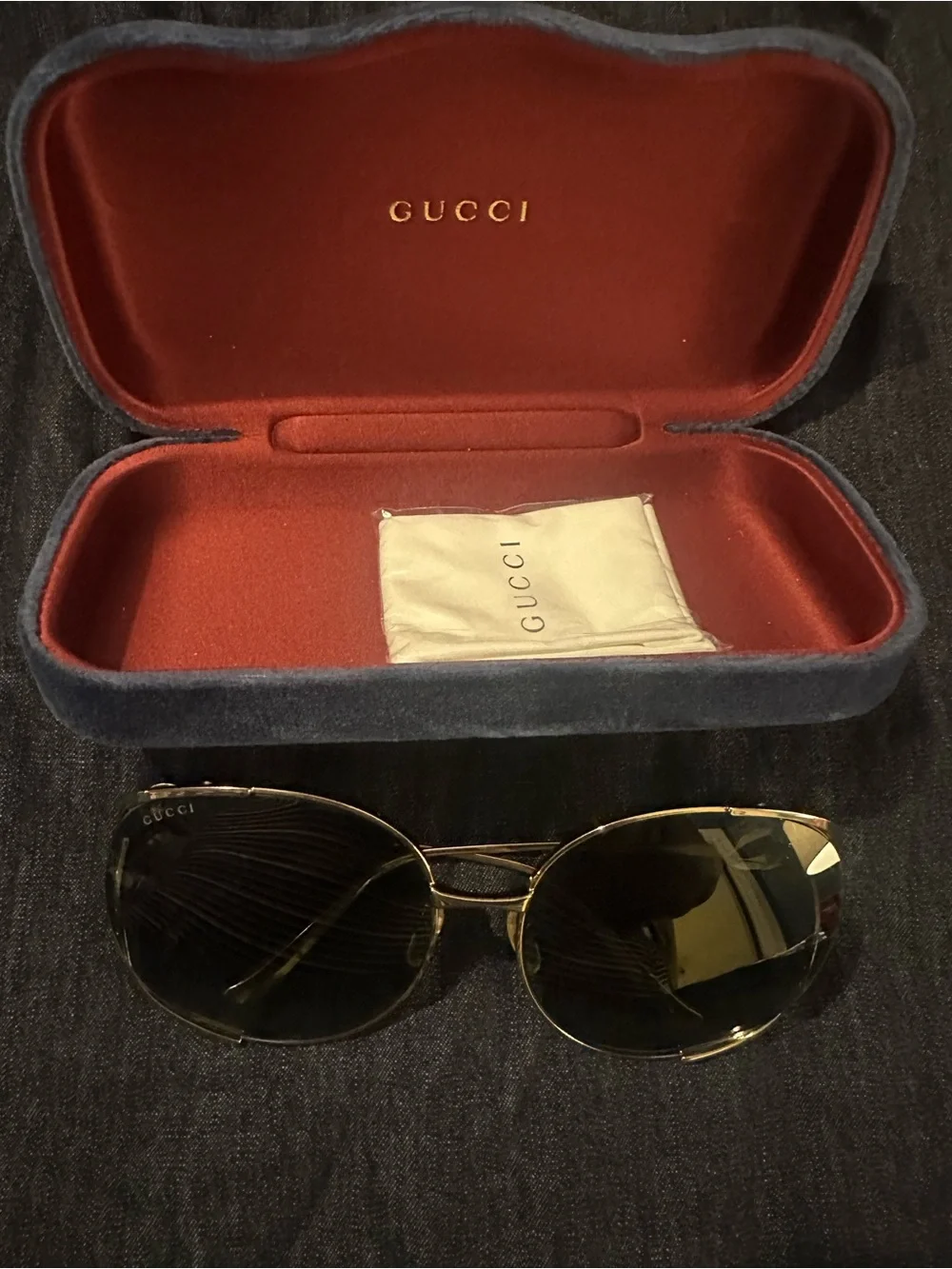 Gucci Gold Shield Sunglasses with Black Lenses and Green-Red Temple